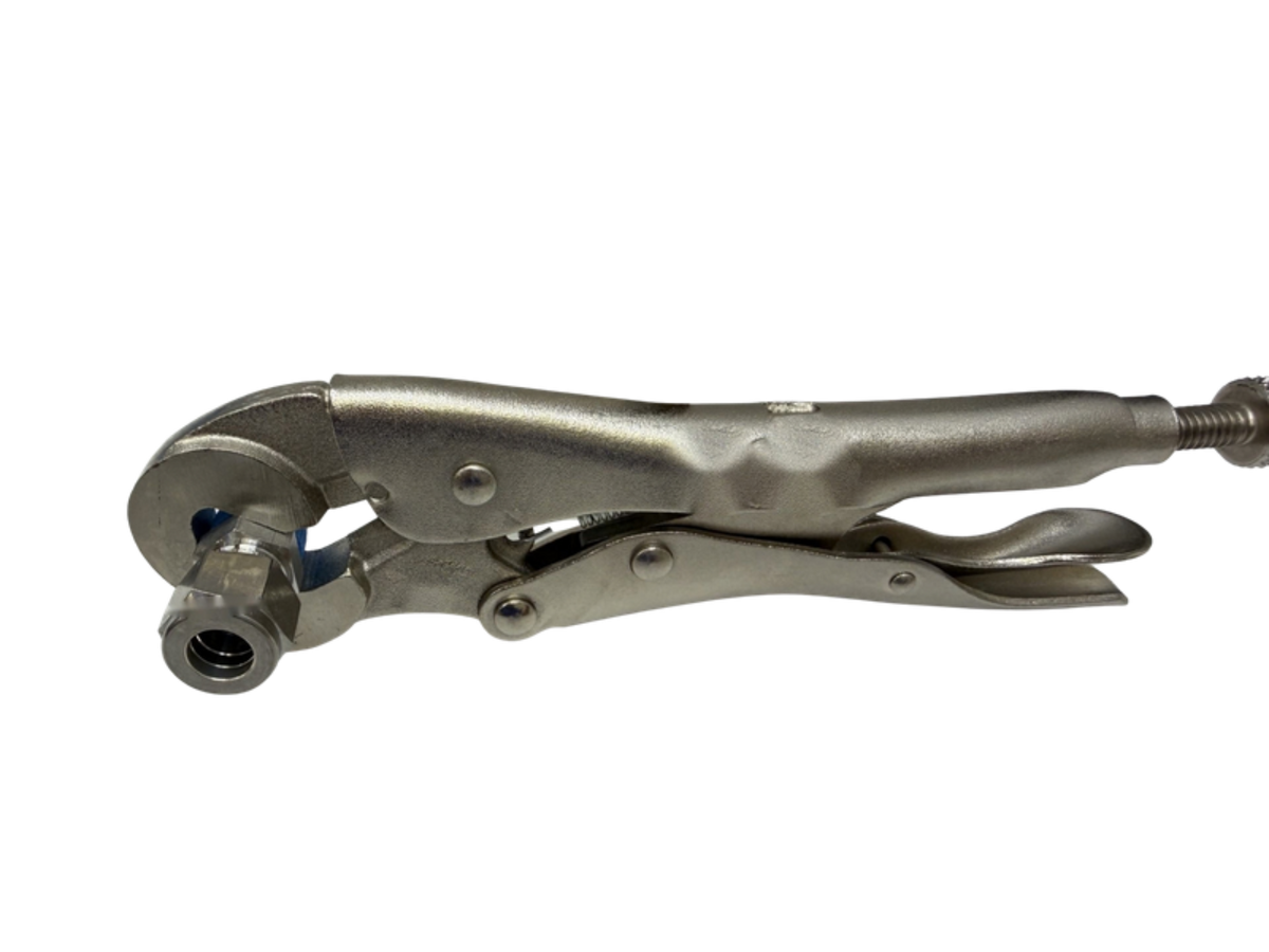 Fitting Tool holding a stainless steel tube fitting