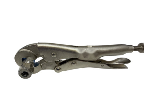 Fitting Tool holding a stainless steel tube fitting