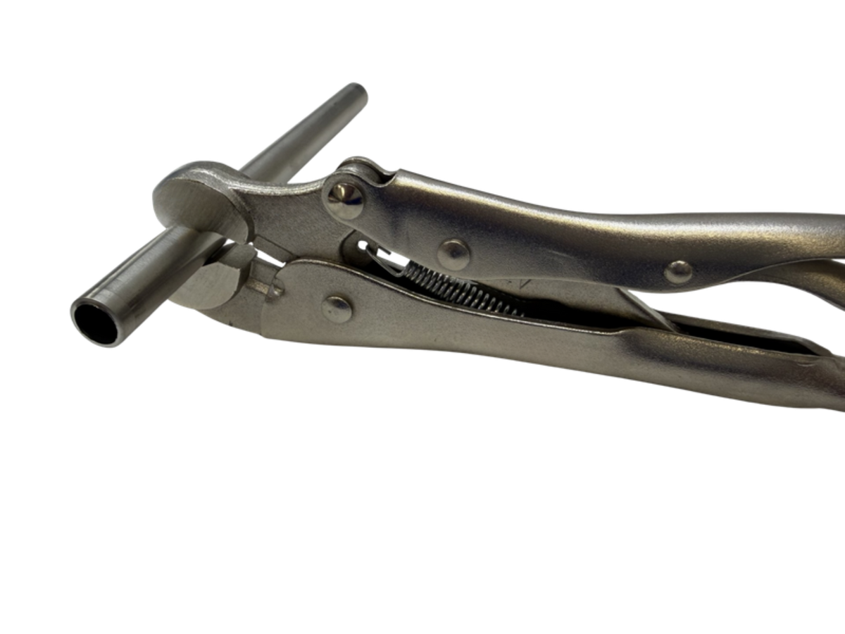 GRIP-IT TOOL holding stainless steel tubing steady while it is cut with a tube cutter