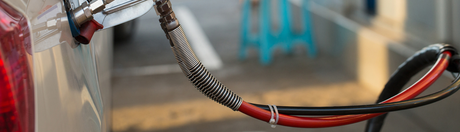 CNG hose assemblies fueling a bus, a trash truck and a vehicle